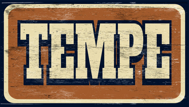 Age and worn vintage Tempe sign on wood