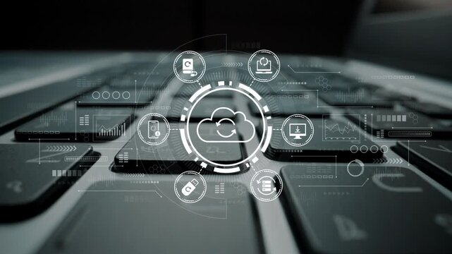 Close-up View of a Keyboard with Digital Cloud Computing Icons Illustrating Data Management and Technological Integration Concept in a Modern Workspace. Entropy.