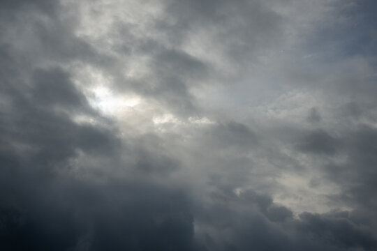 Dramatic Cloudy Sky with Subtle Sunlight Breaking Through