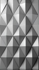 Obraz premium A grayscale geometric pattern of 3D triangular facets