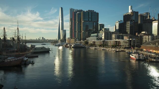 Timelapse of the view from Pyrmont Bridge crossing Darling Harbour looking past King's Street Wharf to the skyscrapers at Barangaroo, Sydney, Australia.