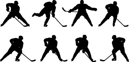 Set of dynamic black silhouette ice hockey players skating and shooting isolated on white background © Jahanara