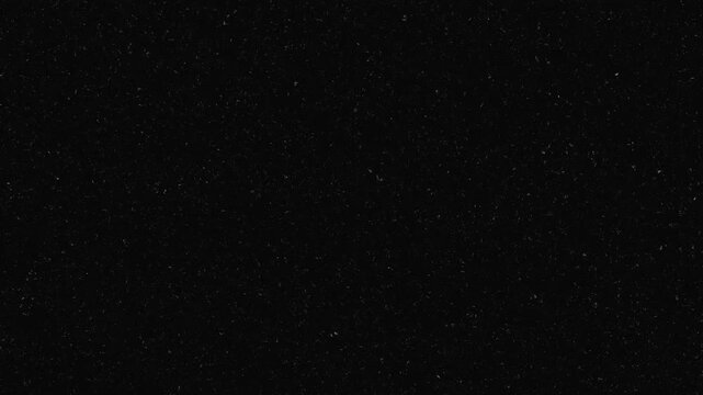 Dark Textured Background with Subtle White Speckles .Noice glitch motion animation video,TV noice background,Ultimate Bad TV Signal