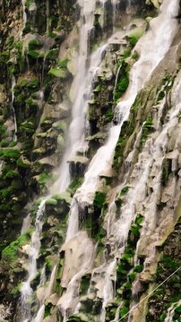 Thermal waters of the Grutas de Tolantongo, Hidalgo Beautiful, view of the waterfalls in vertical aerial shot