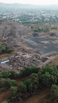 High-angle perspective revealing the ancient pyramids and ruins of Teotihuacan, Mexico