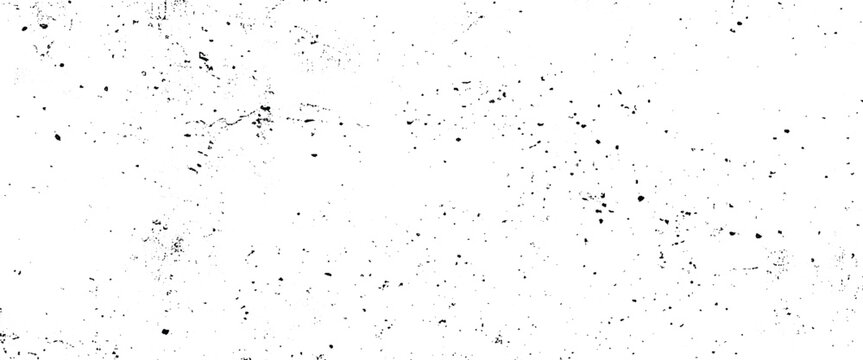 Black speckles and grunge textures on a white background abstract pattern