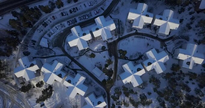 Snowy suburbs form above