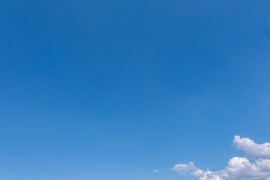 Clear Blue Sky with Soft White Clouds and Bright Natural Daylight Background, Beautiful Clear Blue Sky with Soft White Clouds and Ample Copy Space
Clear blue sky with soft white clouds on a bright sun