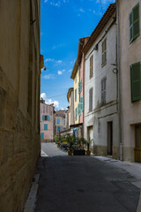 Fototapeta premium Saint-Maximin-la-Sainte-Beaume, typical houses, colorful buildings in the historic center 