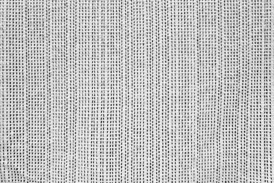 White Hand Woven Fabric Texture with Vertical Stripes.