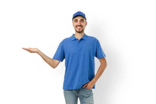 Smiling delivery man in blue uniform with arm out, isolated, PNG