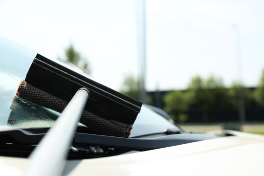 Preparing a vehicle's windshield for refueling, space for text