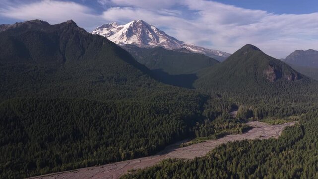 Aerial wide clear view of Mount Rainier and Nisqually River in Washington in summer near Ashford