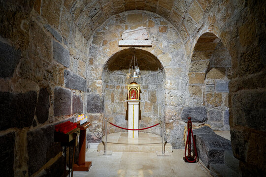 Ancient stone shrine and relic altar inside the Basilica of Saint Antiochus (Basilica di Sant'Antioco Martire) in Sardinia, Italy