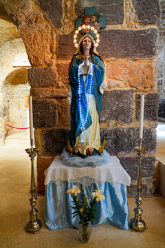 Devotional statue of the Virgin Mary inside the Basilica of Saint Antiochus (Basilica di Sant'Antioco Martire) in Sardinia, Italy