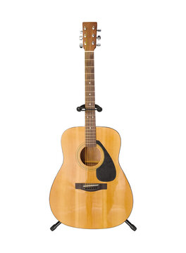 acoustic guitar with stand isolated on white background