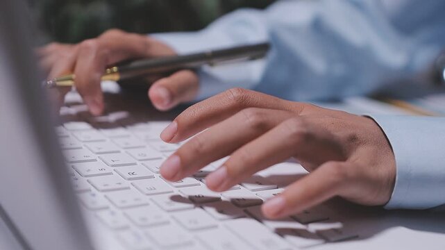 Accountant woman working on financial investment on calculator, calculation, business growth analysis and marketing on graph at office.