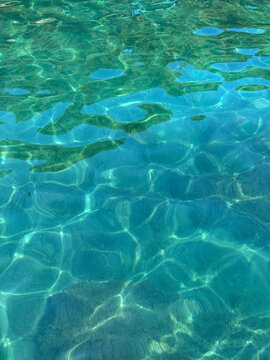 Sea blue green clear water vertical