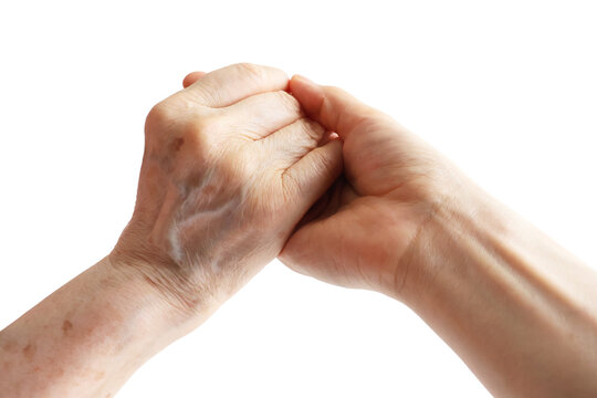 Young and Senior Hands Holding Each Other Isolated on White Background
