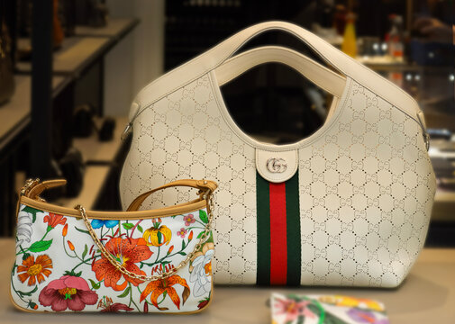Items from Gucci&rsquo;s summer collection in the window of a luxury shop. Milan, Italy, 4 July 2026