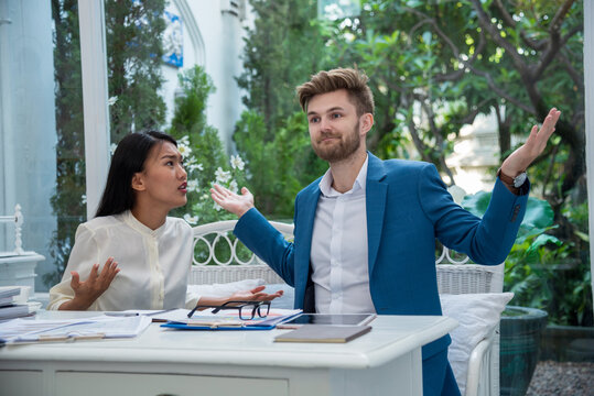 Two Businesspeople argument conflict burnout. Multiracial coworker occupation stress mistake negative guilt irritation emotion problems. people arguing conflict diversity men women displease at work