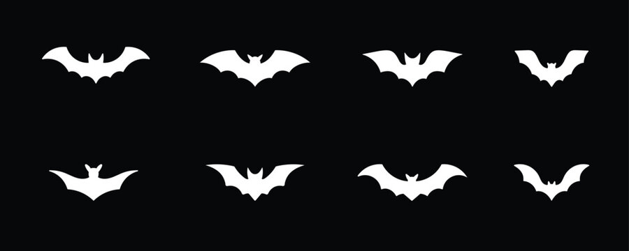 Collection of white bat icon set isolated on black background. Vector bat symbol vampire vector illustration used for Halloween design and spooky themes.