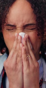 Sick, tissue and woman in house with blowing nose, flu season and illness symptoms with hayfever. Health, sinus issue and person in home with paper napkin, germ infection and sneeze with allergies.