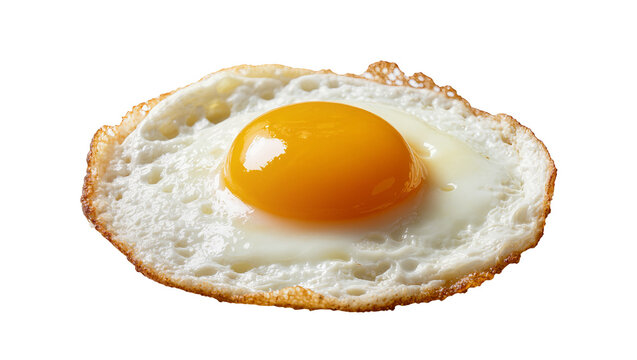 Golden yellow egg yolk and white albumen fried sunny-side up, isolated on transparent background