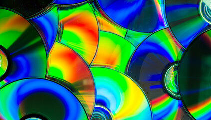 Reflection of the surface of a DVD discs with artistic lighting close-up © Roberto Sorin