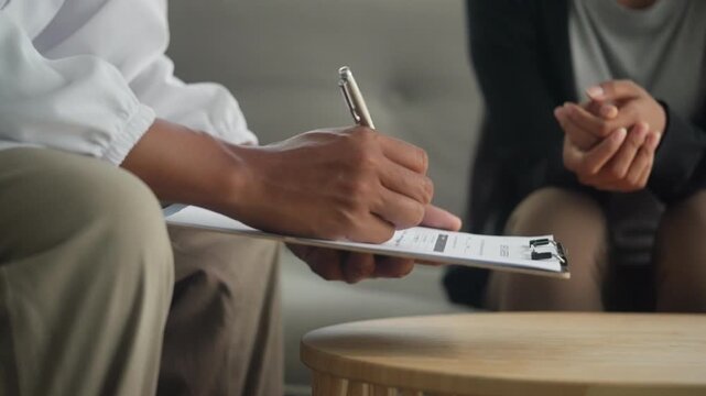 Doctor Explaining Medical Treatment Plan to Patient During Healthcare Consultation