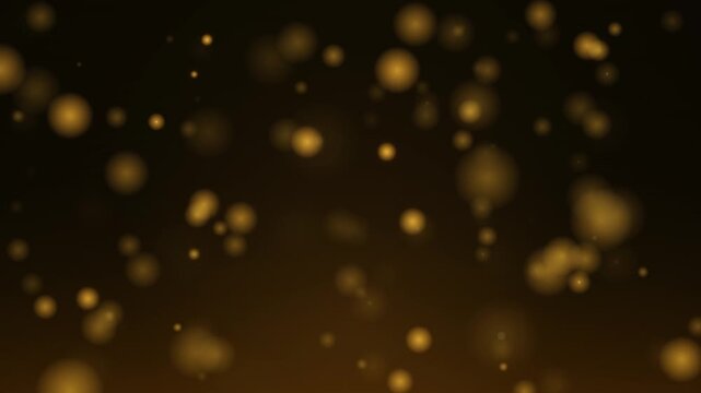 Golden shimmering bokeh lights floating gently in dark space, abstract background for celebration, holiday or luxury themes