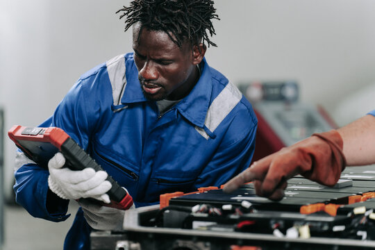 Electric Vehicle Battery Maintenance and Diagnostics by Auto Technician