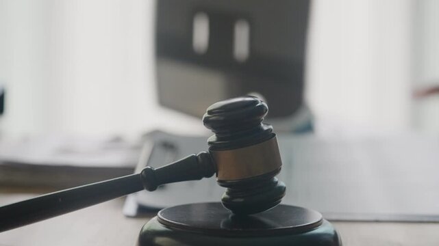 Judge&rsquo;s Gavel with Legal Documents Ready for Review in Professional Law Office