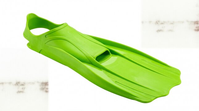 Bright green swimming flipper for snorkeling and diving