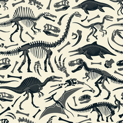 Seamless pattern of monochrome dinosaur skeletons and fossils on beige © mawar