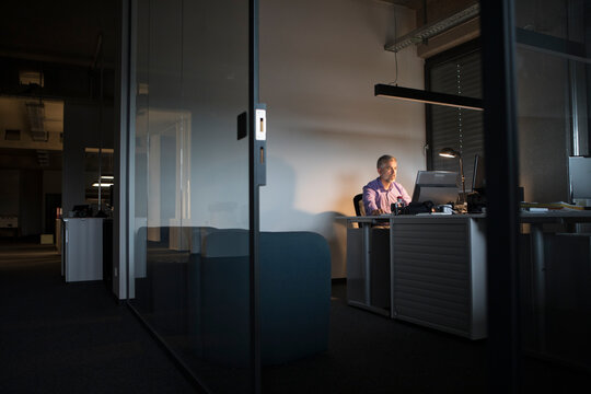Businessman working late in office