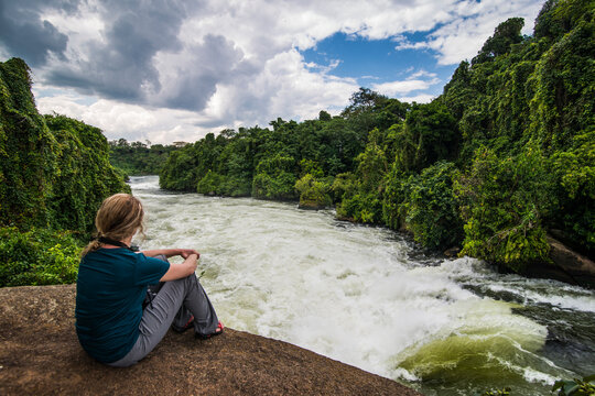 Africa, Uganda, Jinja, Tourist watching the Nile falls