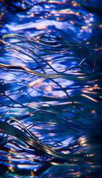 Abstract blue liquid reflection with dynamic wavy lines
