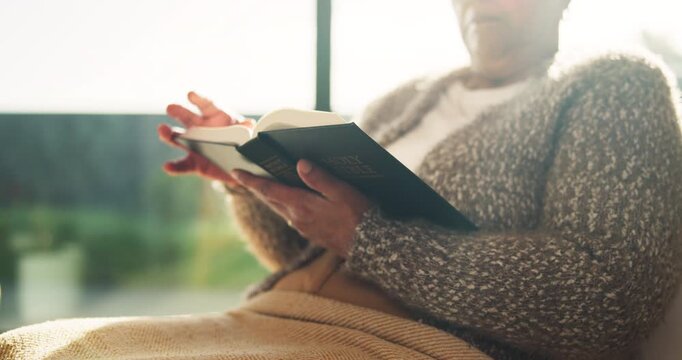 Senior, hands or woman reading with bible for literature, scripture or knowledge in retirement home. Elderly, female person or pages with holy book for faith, religion or belief in old age house
