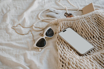 Eco-Friendly Bag with Tech and Sunglasses, Natural Tones and Clean Aesthetic © Floral Deco