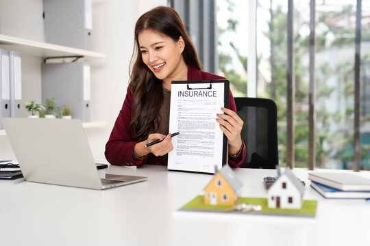 Asia business woman professional real estate sale agent talking explaining business contracts, lease agreements, loans and banks for new home purchase  via video call.