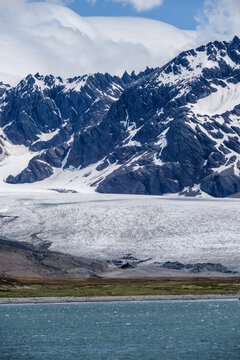 Natural scenery of snow-capped mountains and glaciers in St Andrew's Bay, South Georgia Islands