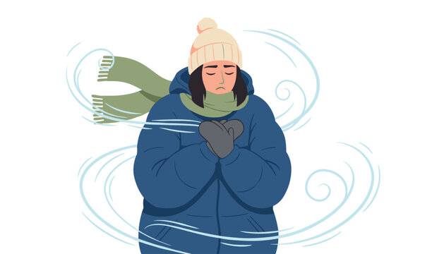 Woman struggling against strong winter wind while wearing a thick blue coat and green scarf during a cold and blustery day.