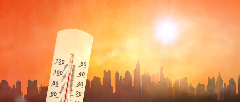 Extreme Heat Wave Over City Skyline with Thermometer and Blazing Sun