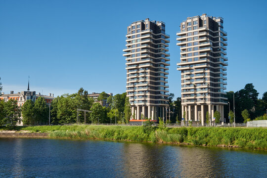 Contemporary apartment towers and residential complex on the riverbank in Riga.