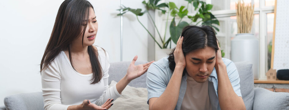 Relationship problem. Asian couple fighting at home.