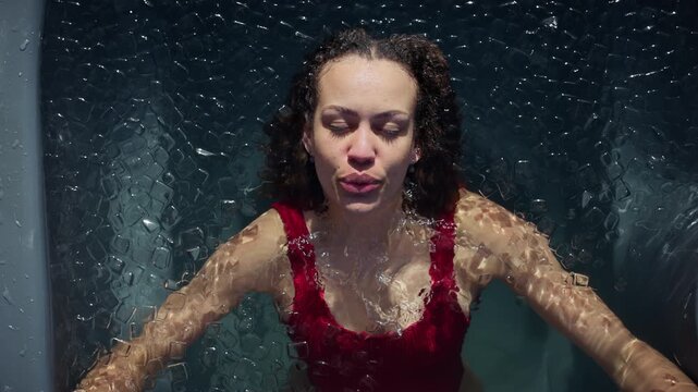 Woman doing ice bath cold plunge