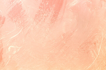 Fototapeta premium Soft pink paint texture on canvas shows brush strokes and layers from an art project made in a studio during daytime