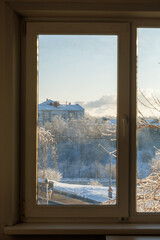 Obraz premium Winter view through window on snowy morning