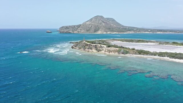 Aerial view of Los Corbanitos beach landscape with lighthouse and Salinas mountain in Bani Dominican Republic.